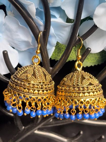 A collection of my simple, budget-friendly daily wear earrings in various blue and gold designs, perfect for college or office wear.