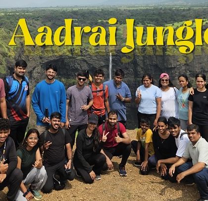 A group photo from our Aadrai Jungle trek, with the famous multiple waterfalls visible in the background.
