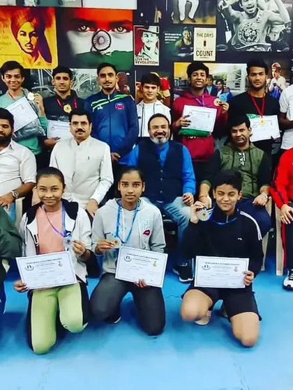 Our team of champions. This is a group photo of our students and coaches after a successful run at the 4th Delhi Open Boxing Championship, where we won 7 gold and 6 silver medals. We train as a team and we win as a team.