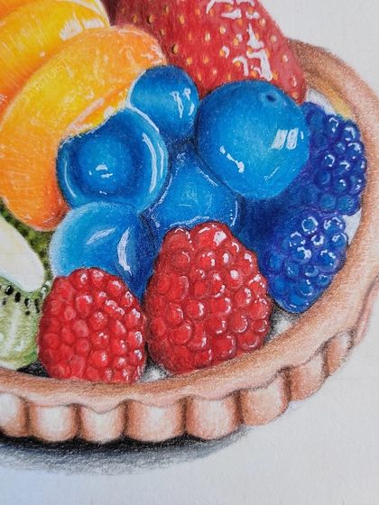 Another close-up of the fruit tart, highlighting the texture of the berries and the flaky crust.