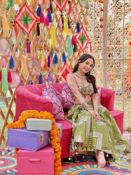 The complete mehendi look, full of colour, fun, and beautiful jewellery.