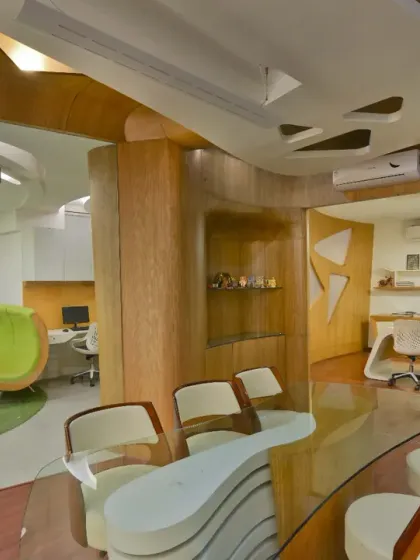 The strategic zoning of my studio places the main cabin and conference room at the rear for privacy, while maintaining visual connectivity with the rest of the office. This ensures a balance between focused work and open collaboration.