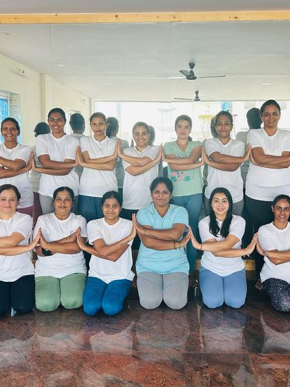 The group in a unified pose, symbolizing the sun and their collective energy. A beautiful end to a powerful practice.
