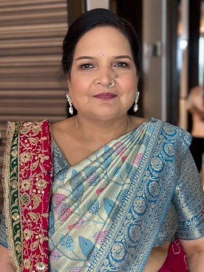 A complete look for the mother of the bride, looking poised and elegant for the Haldi ceremony.