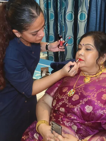 It's always a pleasure working with my repeat clients. This look features a classic red lip and a beautiful jasmine gajra bun, a timeless choice for any festive occasion.