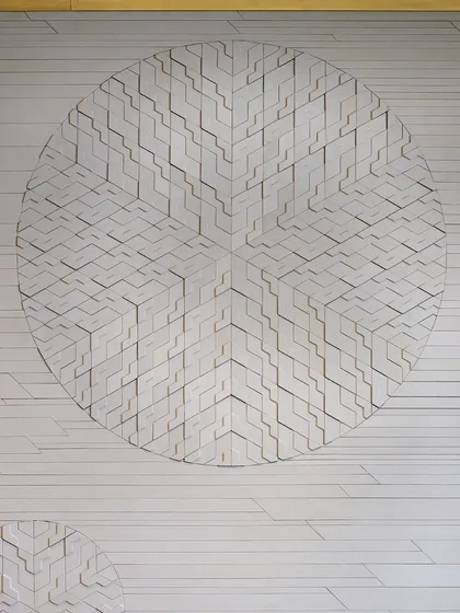 This intricate wall composition weaves a story of order and rhythm. Inspired by the language of lines and the balance of form, the piece reveals a layered geometry that shifts with every gaze, creating a quiet dialogue between structure and subtlety.