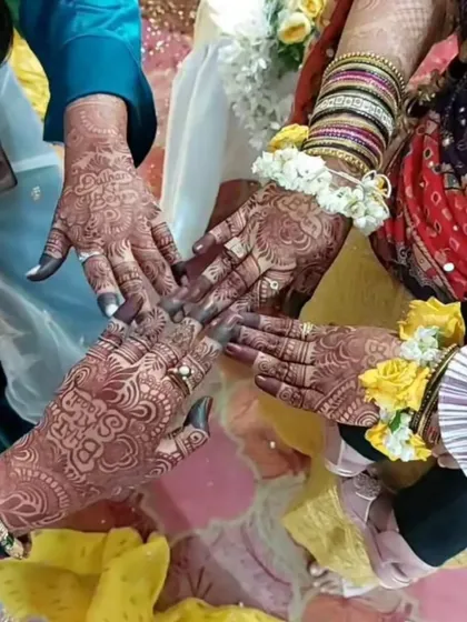A candid shot of hands with my henna, showing the unedited, authentic stain color in natural light. This is the beautiful result you can expect.