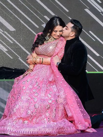 A sweet moment at the end of a beautiful couple's performance. My goal is to create a routine that feels natural and brings you closer together on the dance floor.