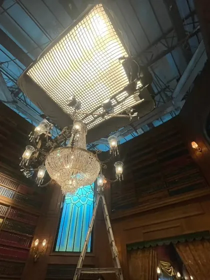 For this television commercial, we engineered a massive overhead rig featuring a Litegear Auroris with a custom 10x10 soft egg crate. The entire setup was suspended on motorized chain hoists, giving the director of photography complete control over this large, soft light source.