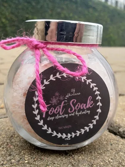 My herbal Foot Soak, made with Epsom salt and pink Himalayan salt. It's designed to soothe tired muscles, hydrate skin, and relieve aches and pains.