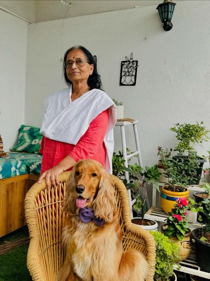 Posto with his Dida, modeling a stylish bow from Furry Tags.
