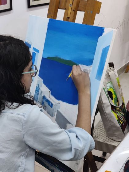 A series of images showing the progression of an acrylic seascape painting, from the initial blocking of colors to the addition of fine details.