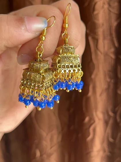 A collection of my simple, budget-friendly daily wear earrings in various blue and gold designs, perfect for college or office wear.