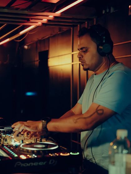 A moody, focused shot of me mixing at Gawky Goose.