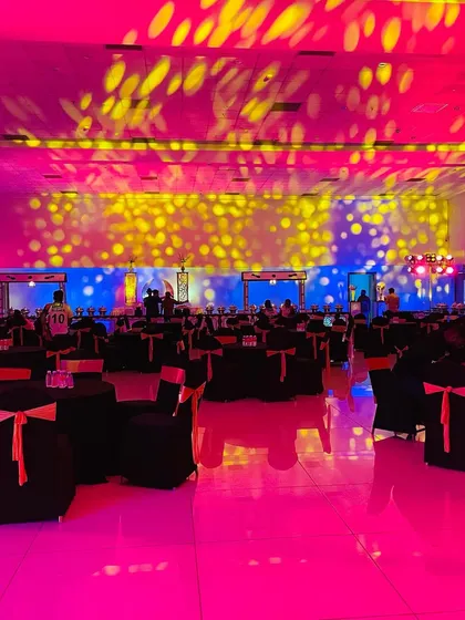 Lighting is everything for a party atmosphere. We used a combination of colorful spotlights and patterned projections to transform the hall into a vibrant and dynamic space.