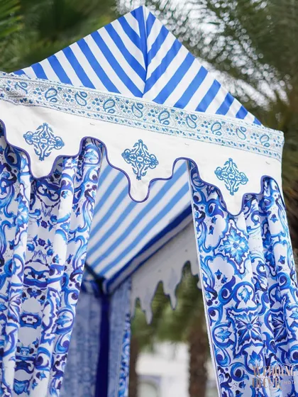 Another detail shot of the beautiful, custom-printed fabric used for the canopies, inspired by traditional Indian motifs.