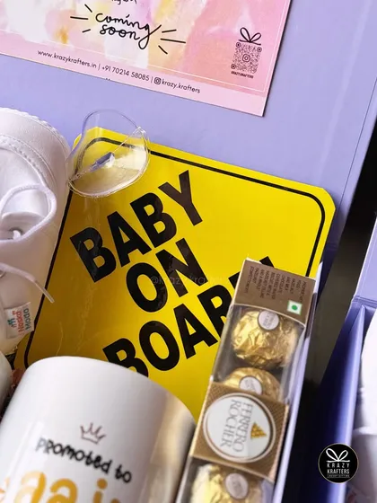 A close-up of the 'Baby on Board' sign, a practical and cheerful item that new parents and grandparents love.