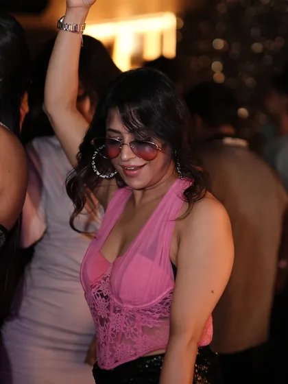 A guest dancing with passion on the floor at Kaze.
