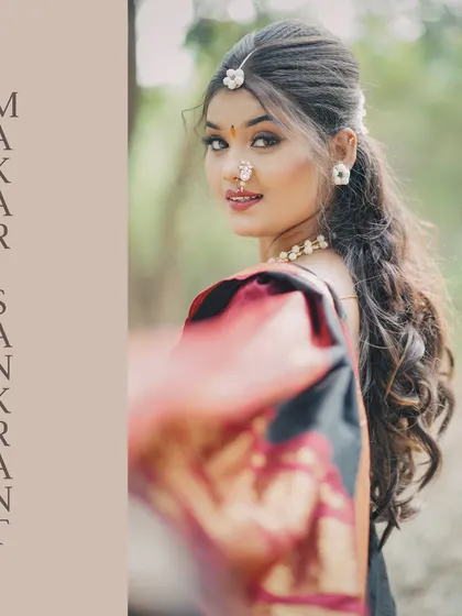 A beautiful Makar Sankranti special portrait of a Marathi Mulgi in a traditional black saree, capturing the festive spirit with a soft, elegant glance.