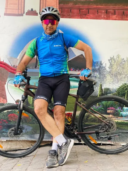 A member posing with his bike near India Gate. We are proud to call Delhi's iconic landmarks our playground.