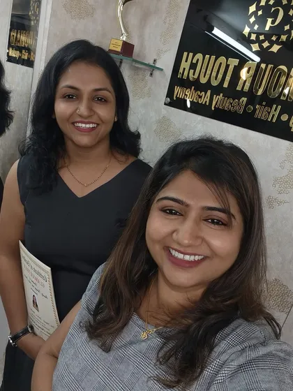 A happy moment with one of my graduates. I believe in building a personal connection and mentoring each student toward their goals.