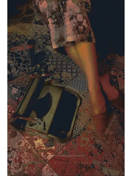 A detail shot focusing on the styling of the lower half of the outfit and a vintage typewriter. This shot adds texture and a narrative element, hinting at stories being written or imagined.