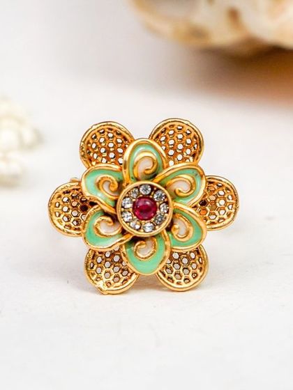 A traditional floral ring shot on a clean white background with minimal props. This highlights the intricate design and colors of the piece, making it ideal for catalogue or website product pages.