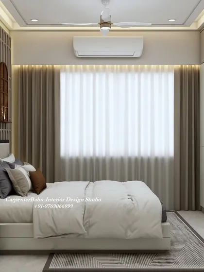 This view shows the clean lines of the full-wall wardrobe and the soft, diffused light from the large window, creating a peaceful and restful atmosphere.