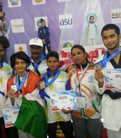 My students proudly displaying their medals and certificates after an international competition. This is the reward for their tireless training.