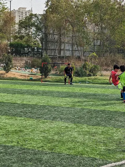 Our players swarm the opponent, working together to win back the ball in a friendly U10 game.