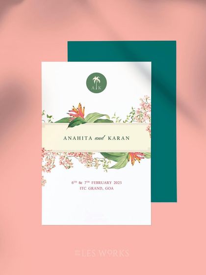 The cover of the tropical e-vite suite, featuring the couple's names and a custom palm tree logo. The design uses a clean layout with a band of rich botanical illustrations.