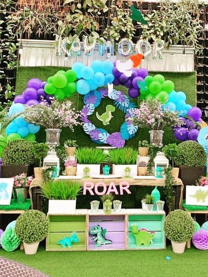 A dino-mite party for a "Three-Rex" birthday. I used a vibrant balloon arch, lots of greenery, and friendly dinosaur cutouts to create a fun and prehistoric world.