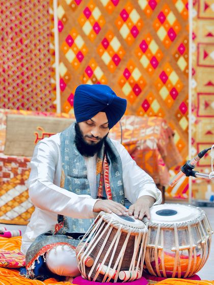A full view of my setup on the colorful stage at the India Habitat Centre.