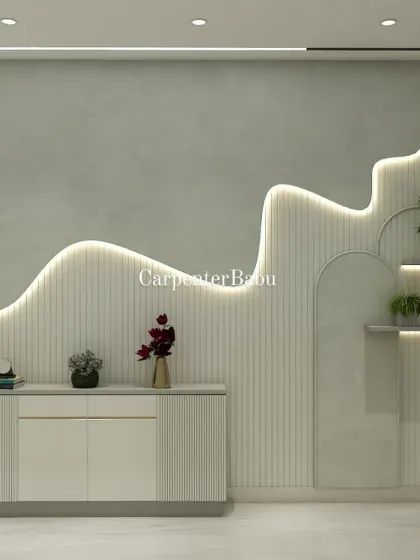 This feature wall has a unique, flowing design with integrated backlighting, creating a sense of movement. The minimalist console table keeps the focus on the artistic wall.