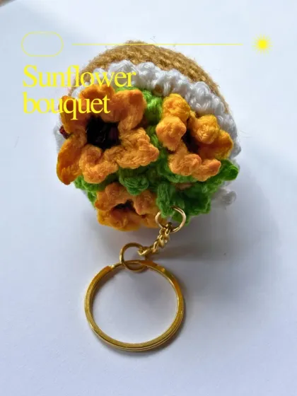 A detailed close-up of my sunflower bouquet keychain. I tried to capture the look of a real sunflower bouquet, just in miniature form. It's a little piece of sunshine.