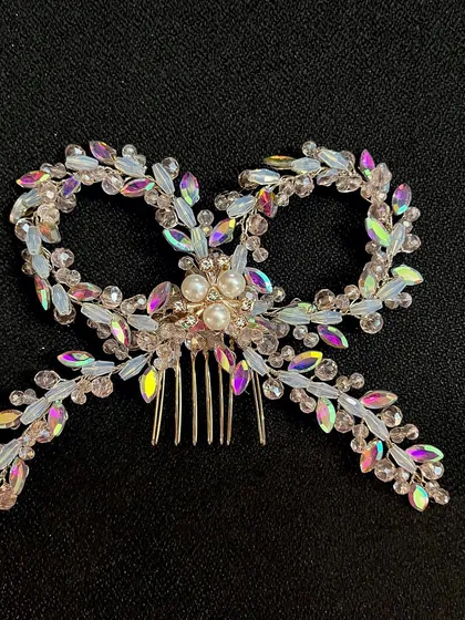 The craftsmanship on these crystal bows is exquisite. They are designed to be the centerpiece of your hairstyle.