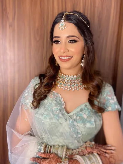 The perfect soft glam look for a modern bride. Aashna's makeup enhances her features while letting her natural beauty shine.