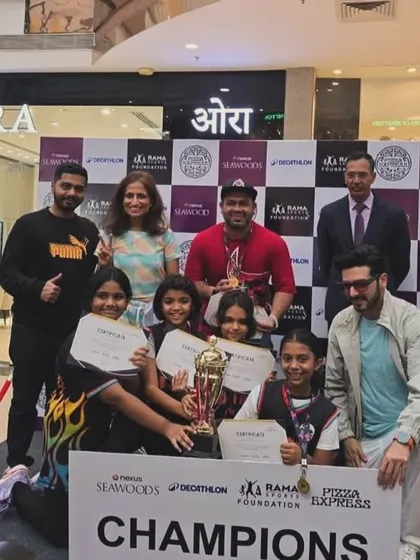 The U-12 girls team with their coaches and supporters, including actor Zuber K Khan, celebrating their championship win.