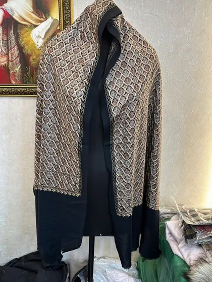 The geometric patterned pashmina, showing how it drapes. The black border provides a nice contrast to the detailed pattern.