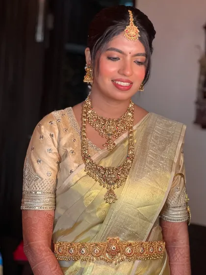 Another beautiful shot of the bride, showcasing the intricate details of her complete look.