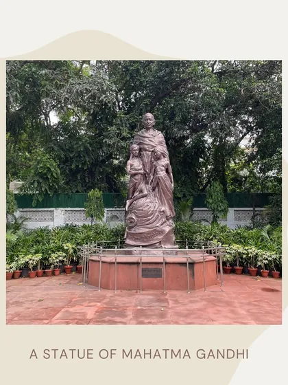 The bronze statue of Mahatma Gandhi at the Gandhi Smriti complex. Such statues are a common feature in public memorialization, and I analyze their iconography and placement to understand how they shape the public's perception of historical figures.