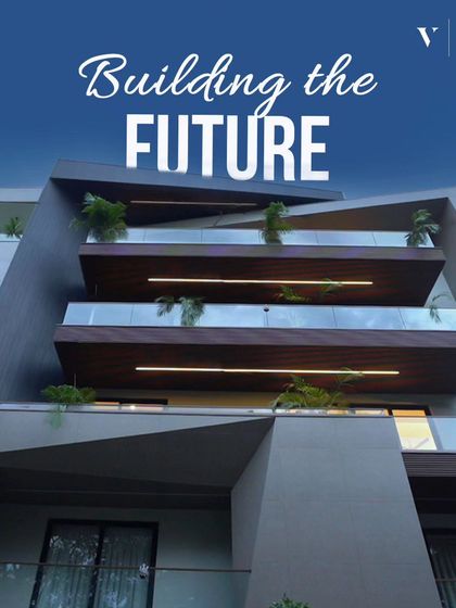 We are pioneering the blueprint for generations to come. This image captures the bold, modern architecture of one of our builder floors, with cantilevered balconies and wood accents.