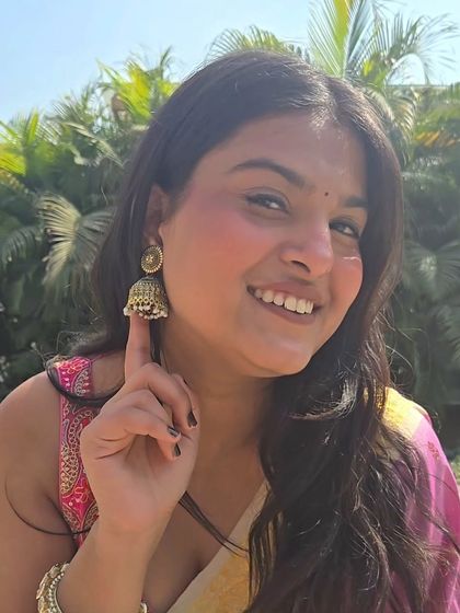 The perfect accessory can make an outfit. I chose these classic gold jhumkas to go with my mom's saree, adding a traditional touch that completed the entire look.