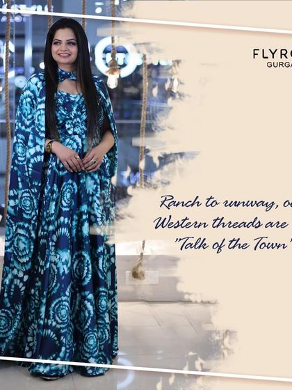 From ranch to runway, my western gowns are the talk of the town. This blue tie-dye print gown with a long train is a true fashion statement.