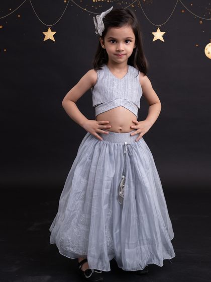 A simple and elegant grey crop top and skirt set, perfect for a minimalist festive look.