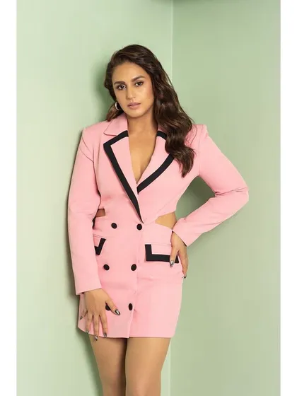 This pink blazer dress from River Island with black lapels and side cutouts is a playful and sexy take on power dressing.