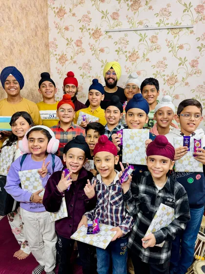 A happy group of students with their Children's Day presents. Their collective joy and energy light up the entire academy.