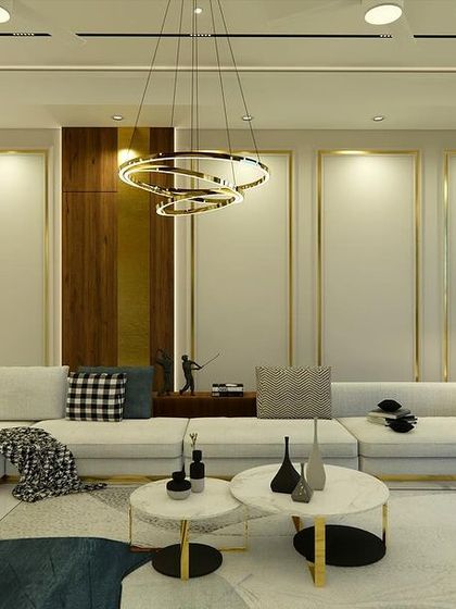 A view focusing on the comfortable L-shaped sofa and the modern chandelier, highlighting the room's inviting atmosphere.