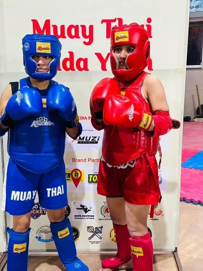 Two of our female fighters geared up and ready for competition at the Pythian Games in Chandigarh. They are strong, skilled, and ready to represent our academy.