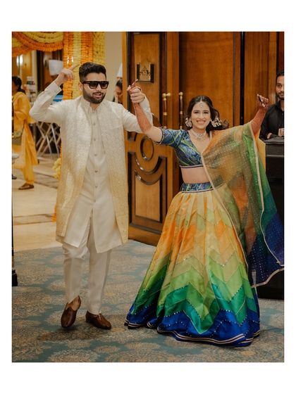 Making their grand entrance for the Haldi ceremony, full of energy and ready for the fun to begin.